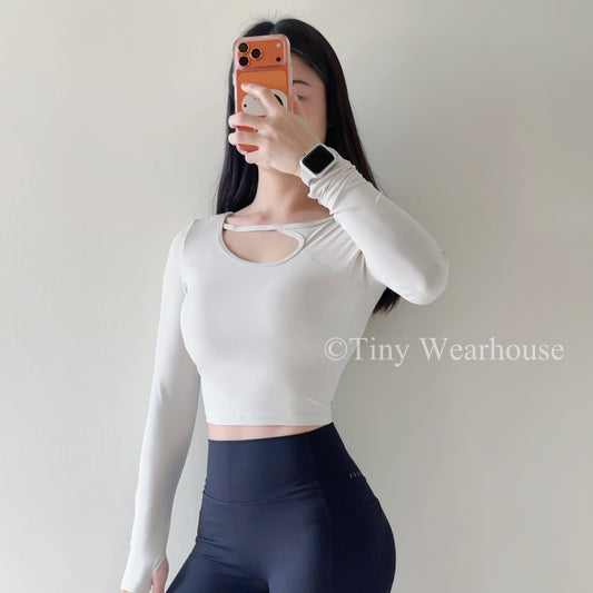 帶胸墊挖空長袖運動上衣（2色）